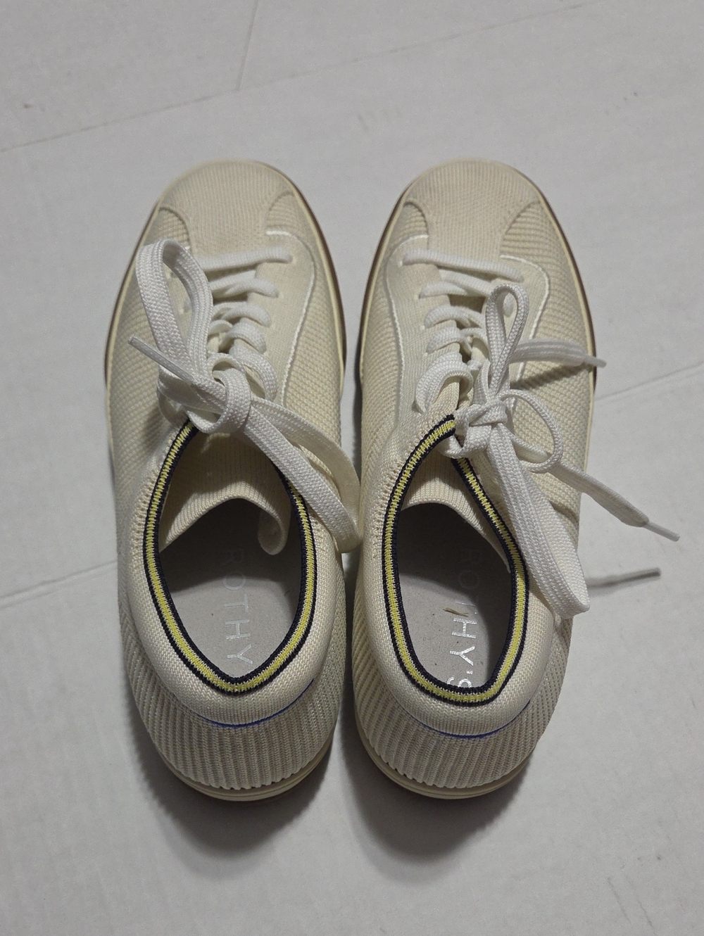Rothy's Cream Knit Lace-Up Sneakers with Yellow and Black Collar Trim